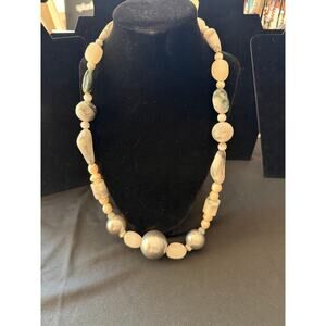 Artisan-style necklace with variety of large natural stone in neutral tones